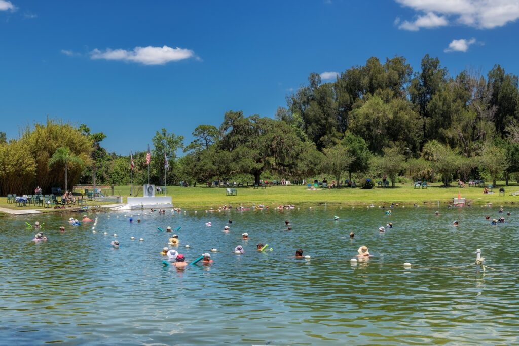 People swim in the lake in Warm Mineral Springs in Sarasota County, Florida, USA
