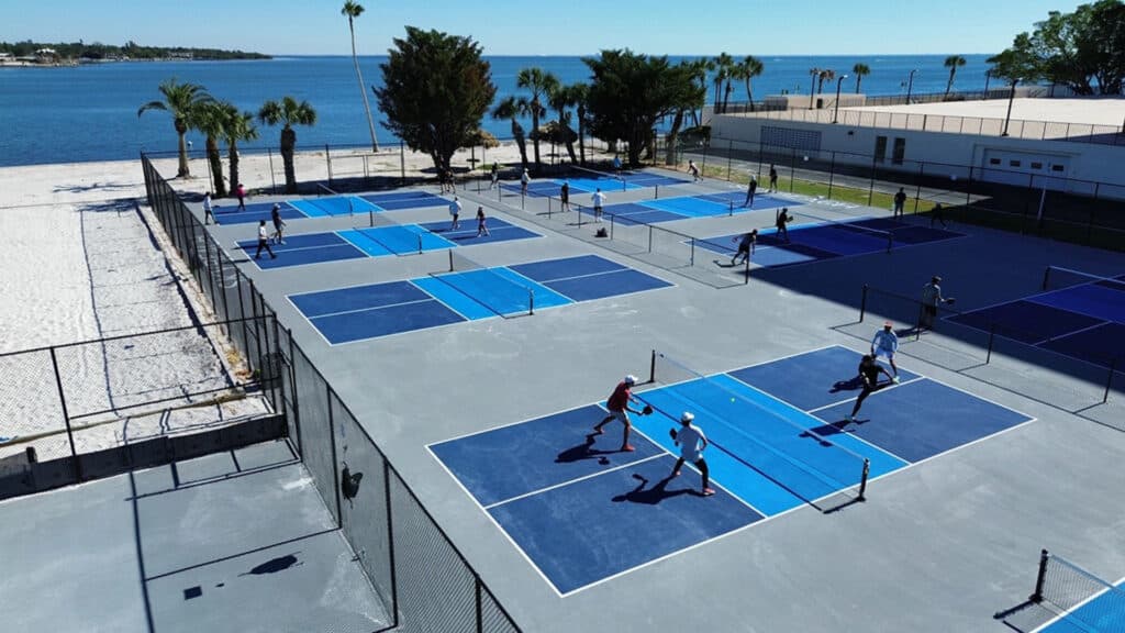 People playing sports on the beach