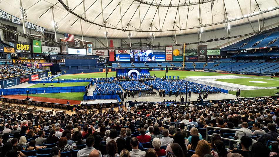 group of graduates and attendees at SPC commencement at Tropicana Field
