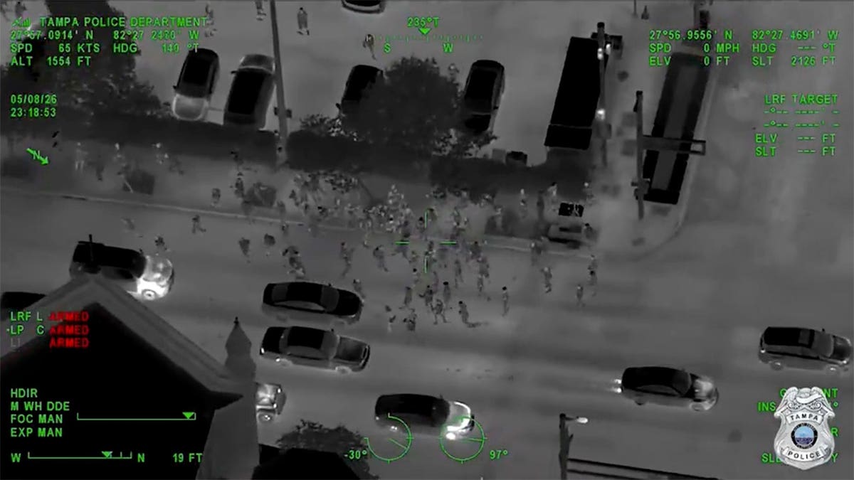 Police officers making arrests at a teen takeover event in Tampa, Florida