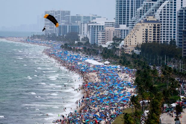 The United States Special Operations Command Parachute Team, known as the Para-Commandos, perform in the Fort Lauderdale Air Dot Show Tour on Saturday May 3, 2025. The show continues on Sunday, May 4, 2025 over Fort Lauderdale Beach. (Mike Stocker/South Florida Sun Sentinel)