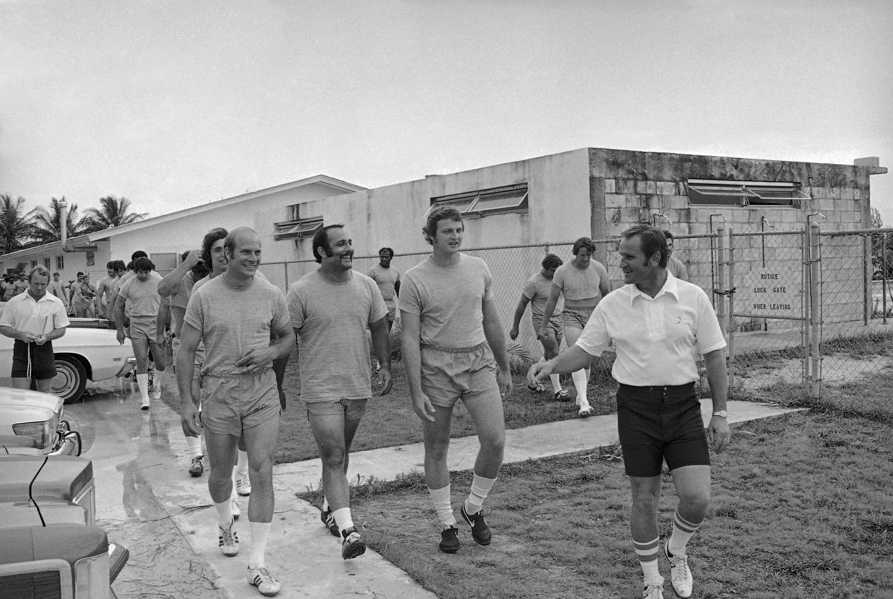 FILE - Miami Dolphins football coach Don Shula leads his...