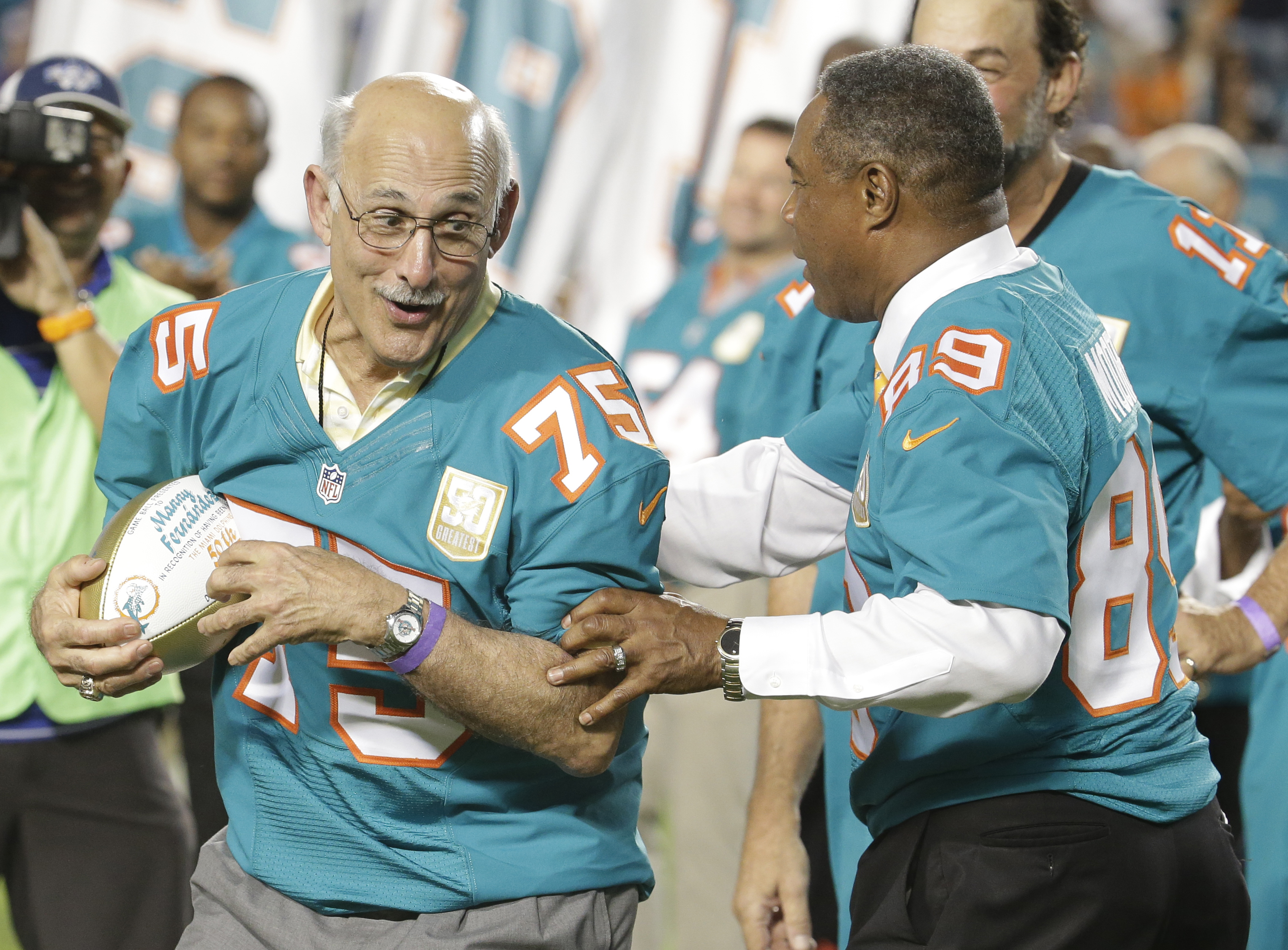FILE - Former Miami Dolphins player Manny Fernandez (75) is...