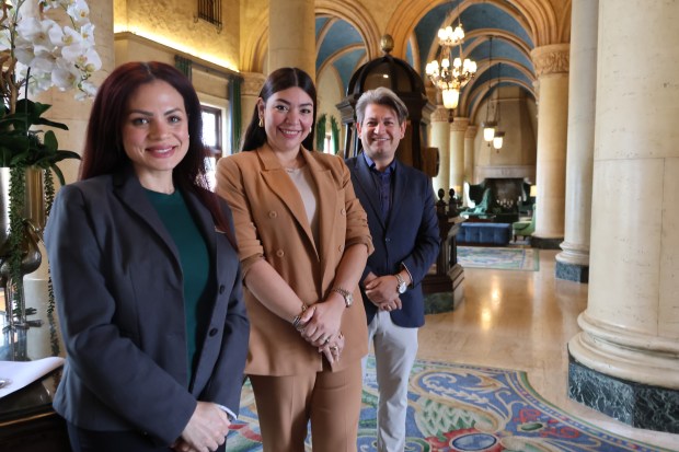 Assistant Director of Human Resources Natalie Then, left, Director of Catering and Conference Services Jenny Rivera, and Director of Human Resources Job Gutierrez at the Biltmore Hotel in Coral Gables. (Joe Cavaretta/South Florida Sun Sentinel)