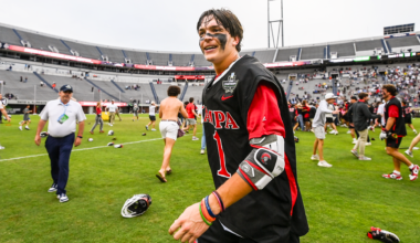 OT hero Tommy Ortega basks in the post-game celebration at Scott Stadium after Tampa's victory over Adelphi in the NCAA DIvision II championship game in Charlottesville, Va.