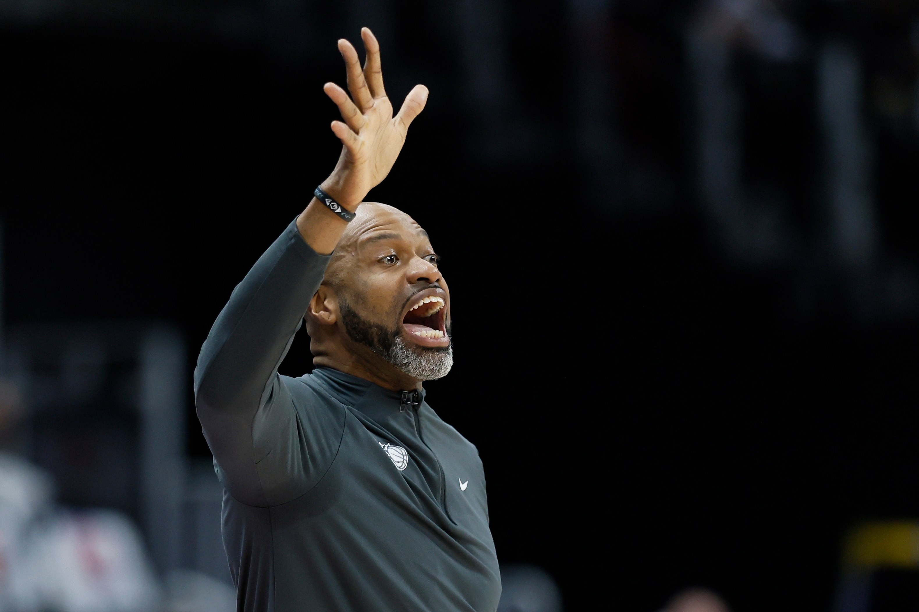 Orlando Magic head coach Jamahl Mosley shouts to his team...