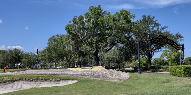 A worker tills the greens at the Winter Park Golf Course (WP9), on Friday, May 1, 2026. (Ricardo Ramirez Buxeda/ Orlando Sentinel)