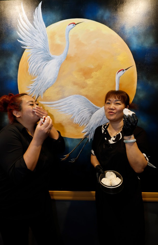 Left to Right, Manager Wendy Vong and Chef Jackie Lau with Steamed Char Siu Bao at Moon Wok, on Monday, May 18, 2026. (Ricardo Ramirez Buxeda/ Orlando Sentinel)