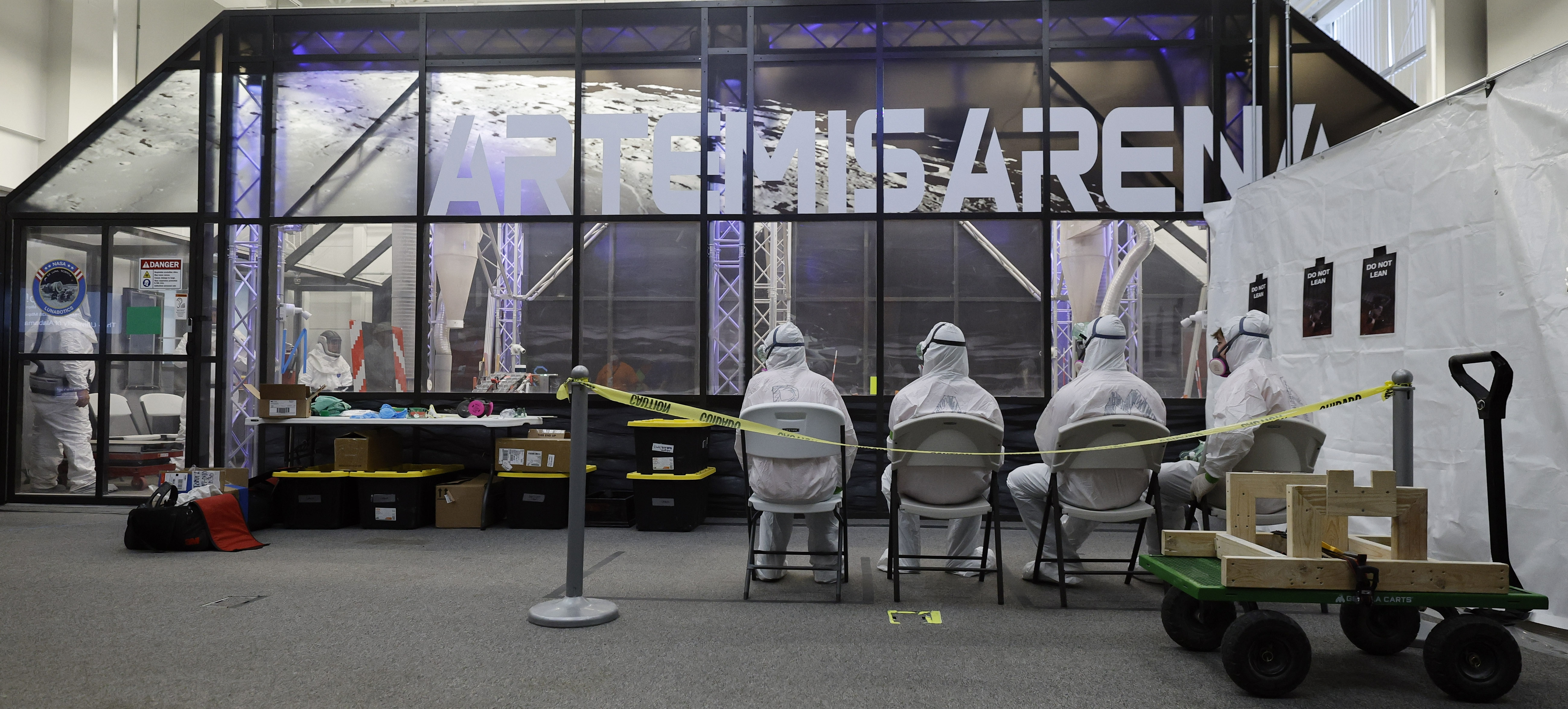 The University of Alabama team members watch their robot make...