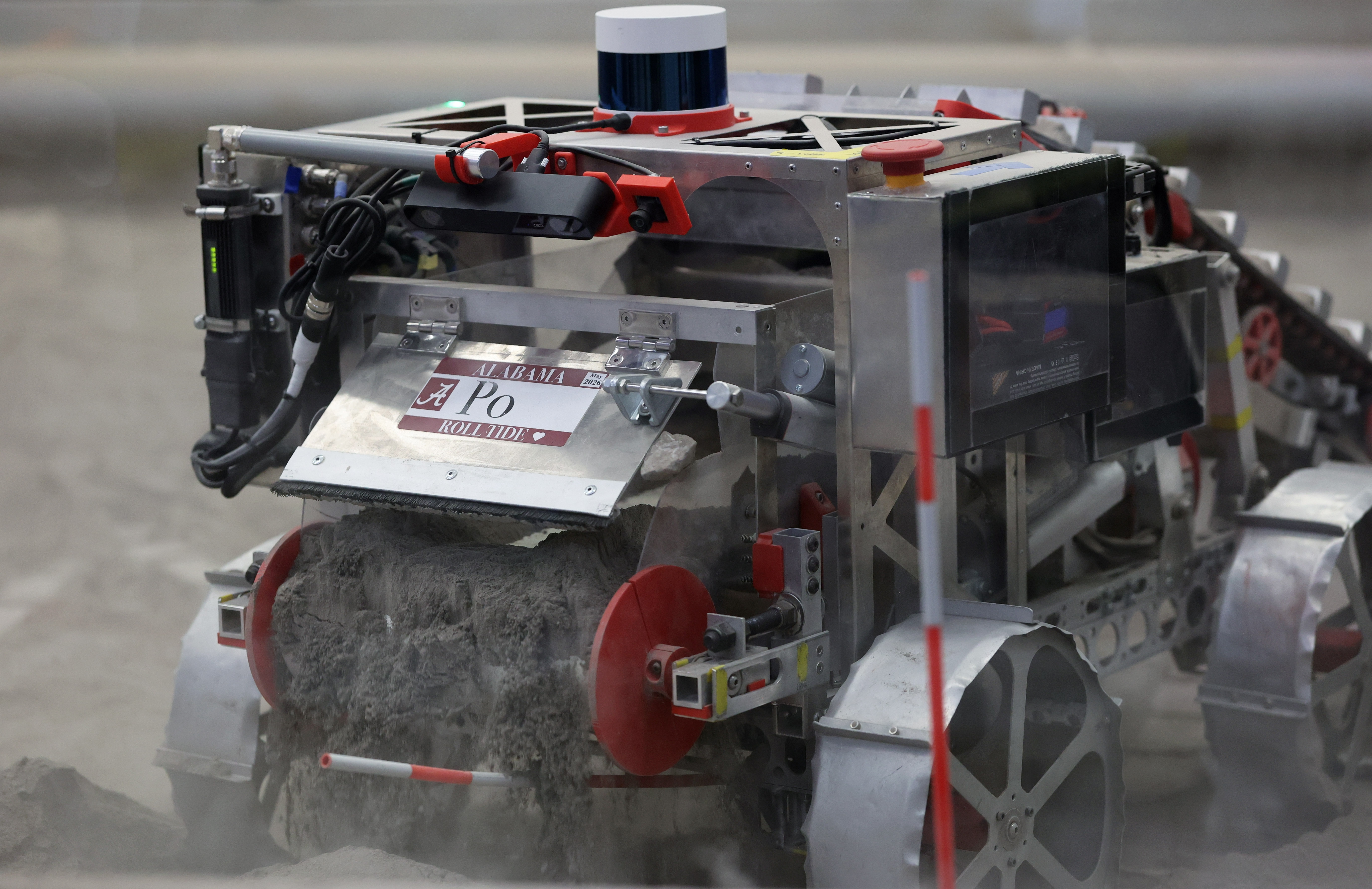 The University of Alabamaâs robot makes a berm during the...