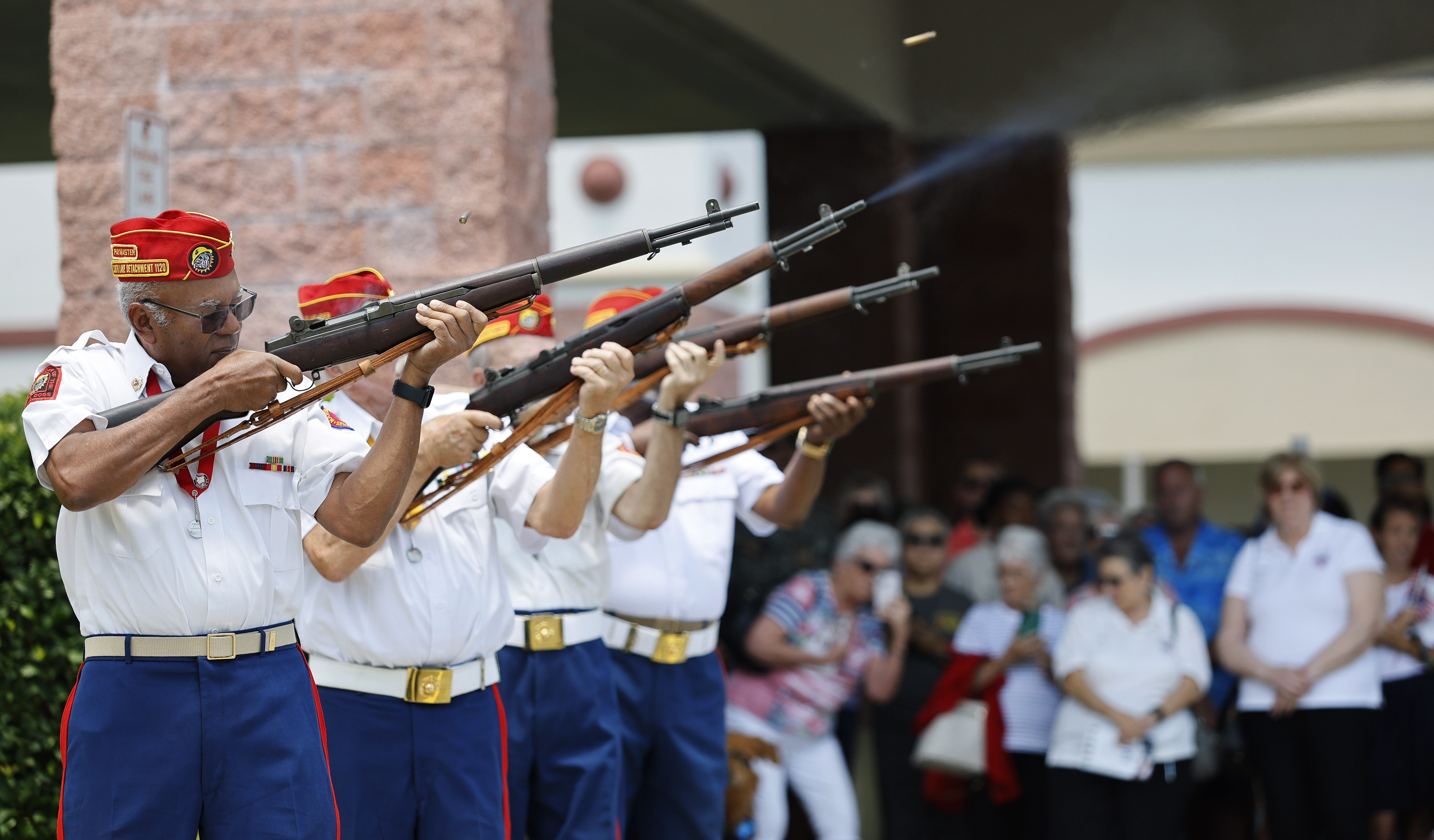 The Marine Corps League Detachment 1120do a rifle salute during...