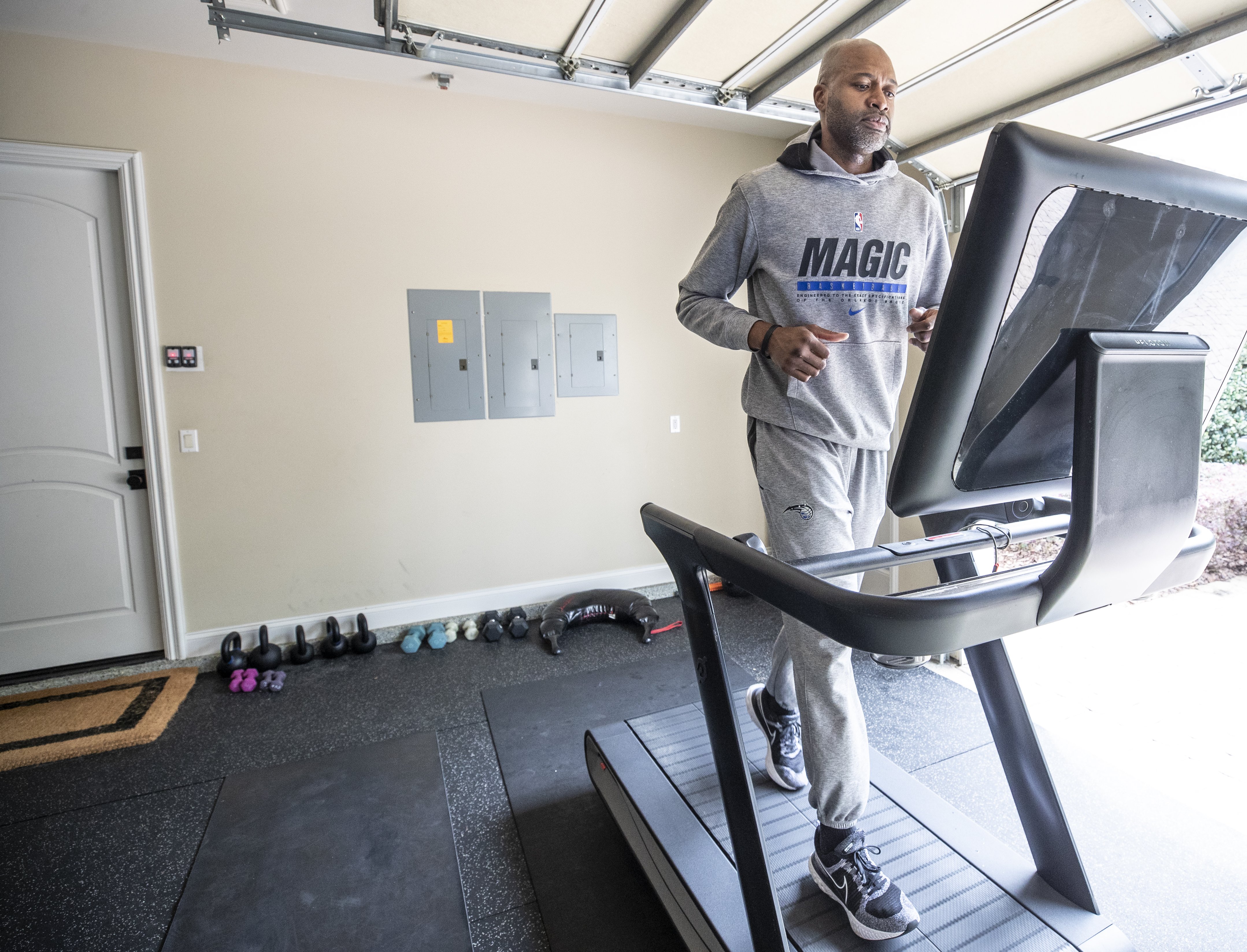 Orlando Magic head coach Jamahl Mosley gets a workout on...