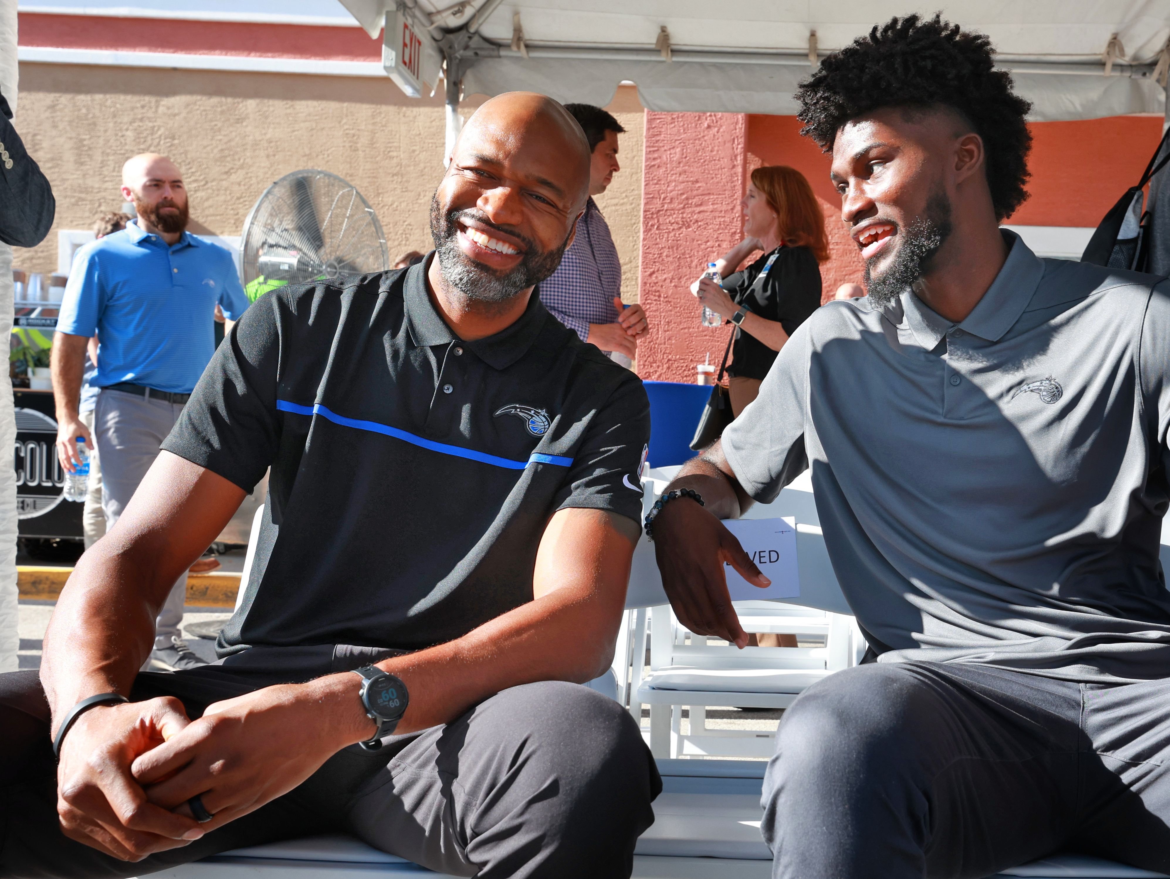 New Orlando Magic head coach Jamahl Mosley and Magic forward...