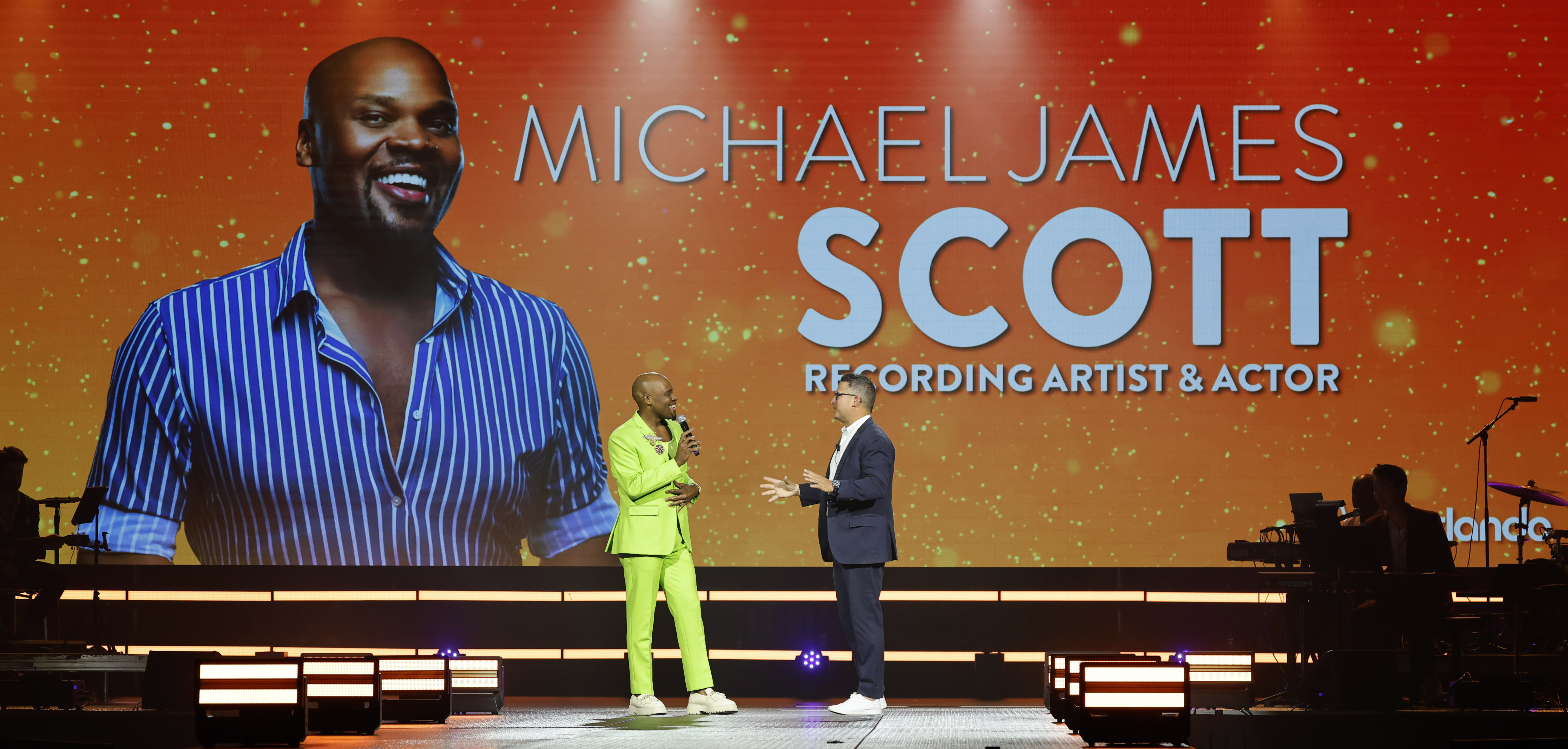 From left, recording artist and actor Michael James Scott talks...