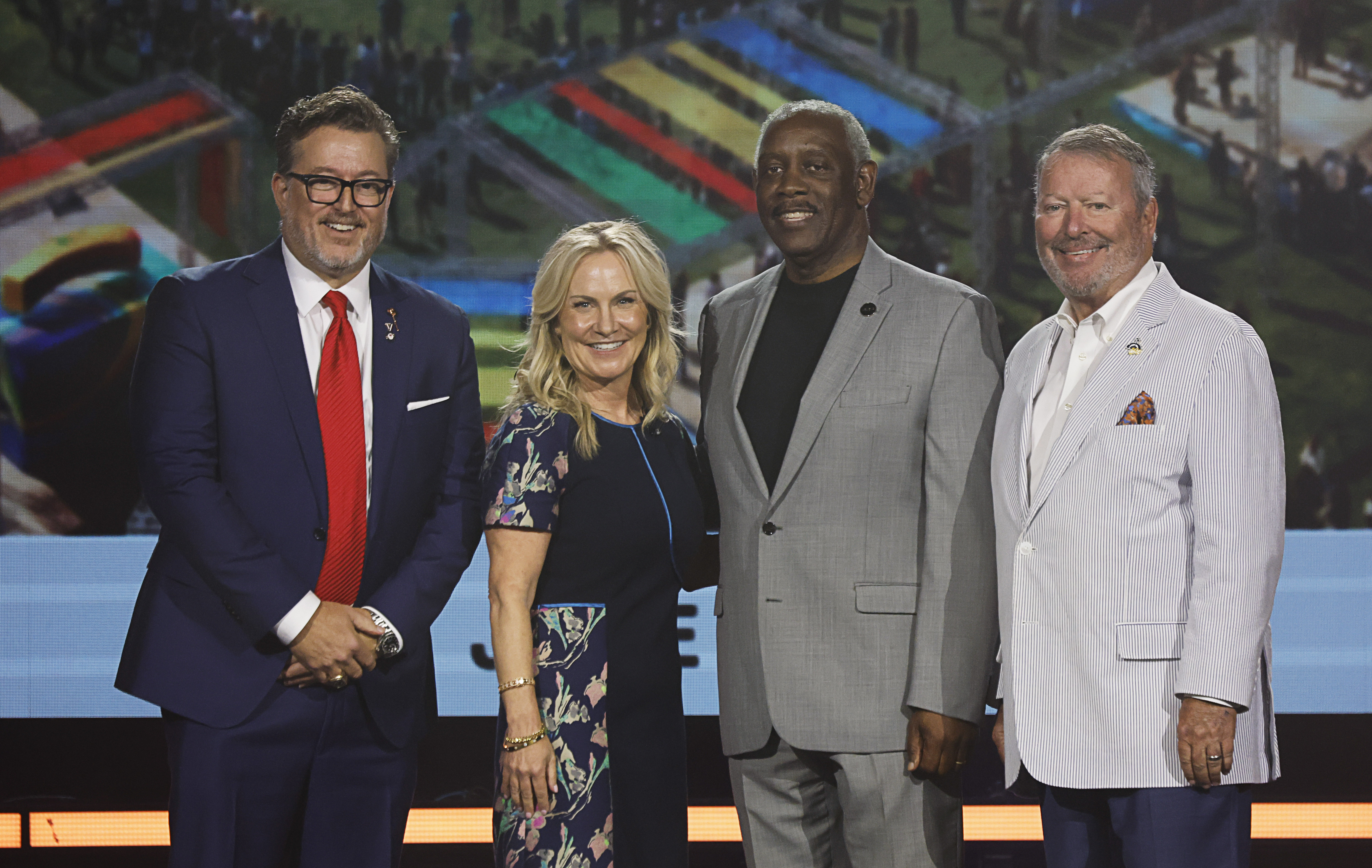 From left, Greater Orlando Sports Commission President and CEO Jason...