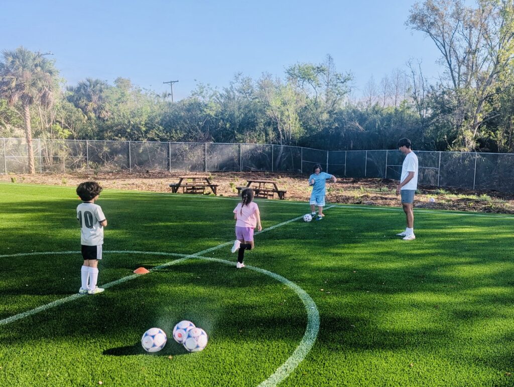 People on a soccer field
