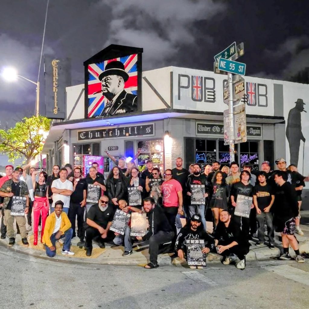 Photo of a group of people outside Churchill's in Miami .