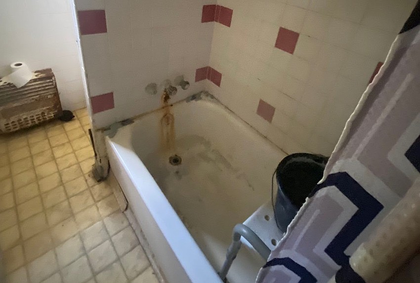 A photo of Carlton Mallard's east Tampa bathroom before renovations.