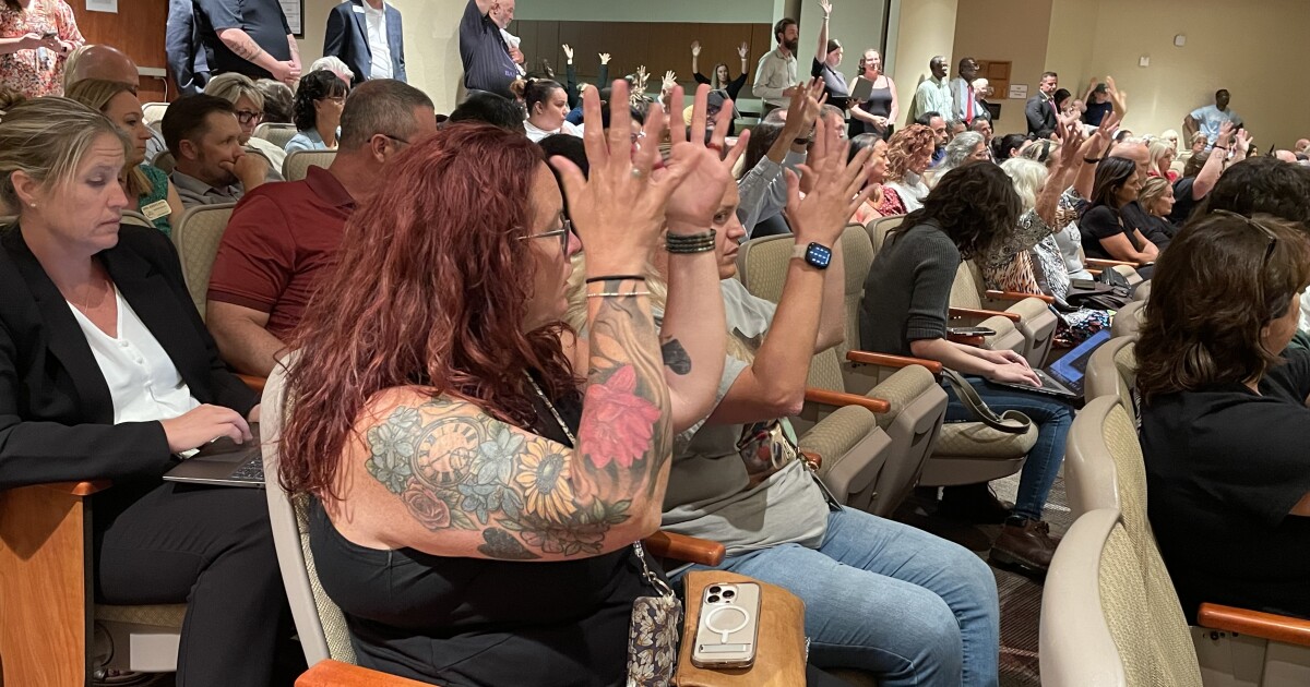 Budget cuts prompt packed board room, impassioned speakers at Lee County school board meeting | WGCU News