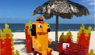 Lego and seaside play on the K.C. Green "This is Fine" meme