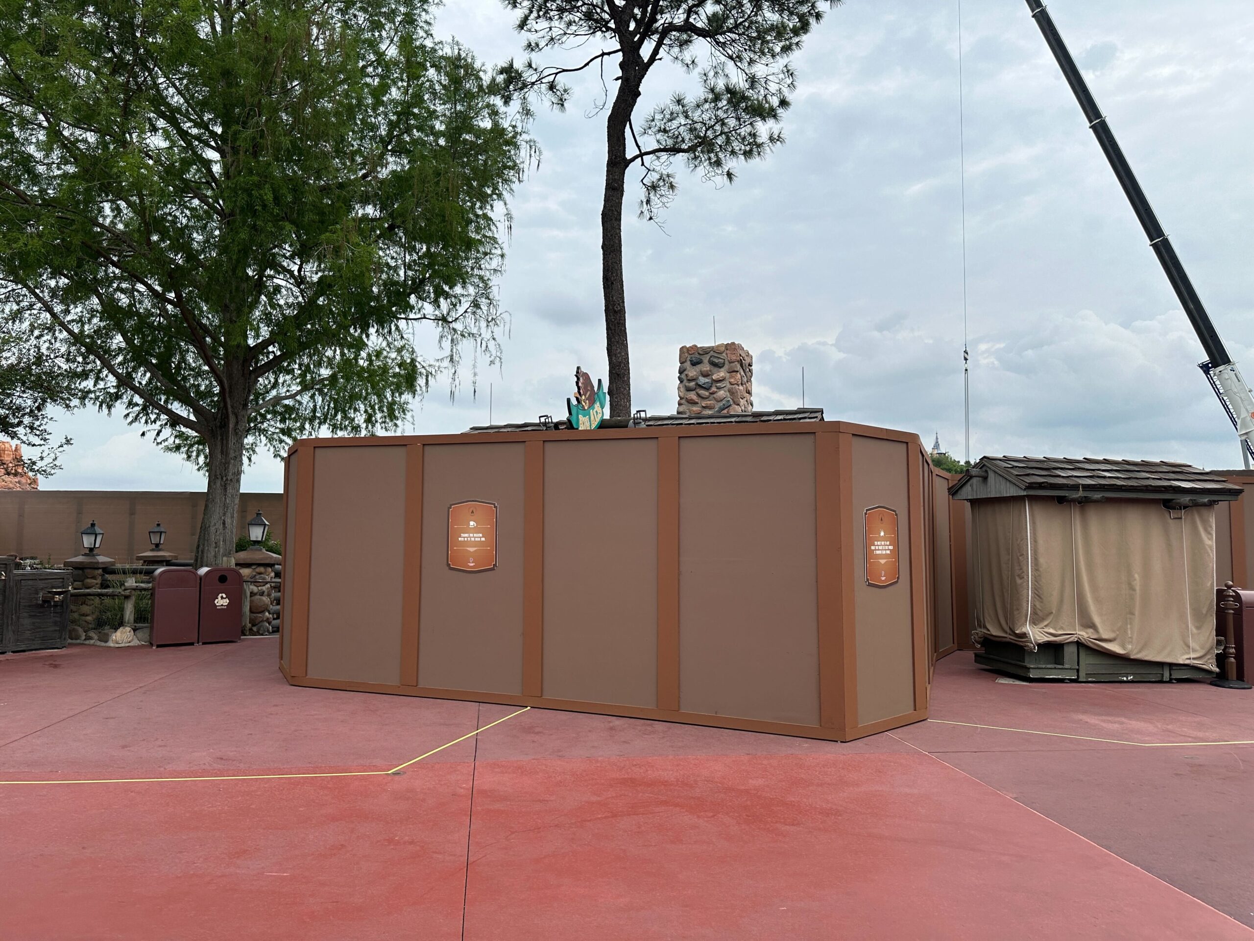 After permanently closing, the Big Al's merchandise kiosk at Magic Kingdom is now surrounded by construction walls.