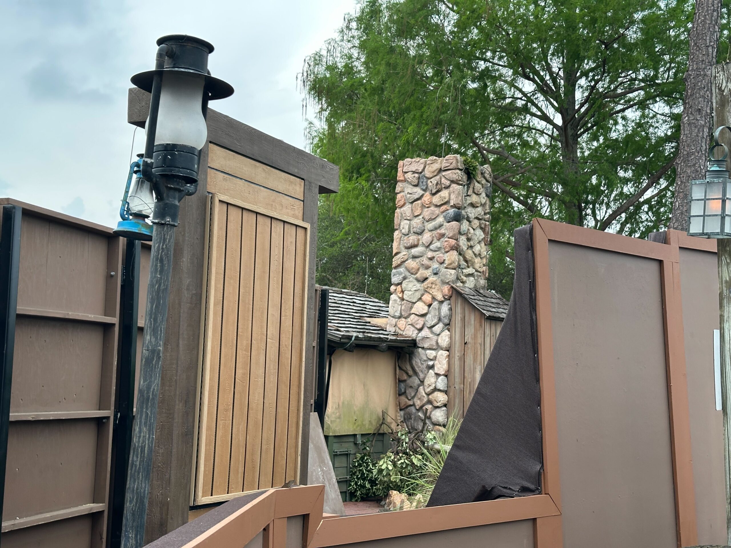 After permanently closing, the Big Al's merchandise kiosk at Magic Kingdom is now surrounded by construction walls.