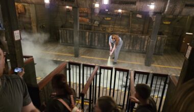 Cast member extinguishes flame at Big Thunder Mountain on reopening day