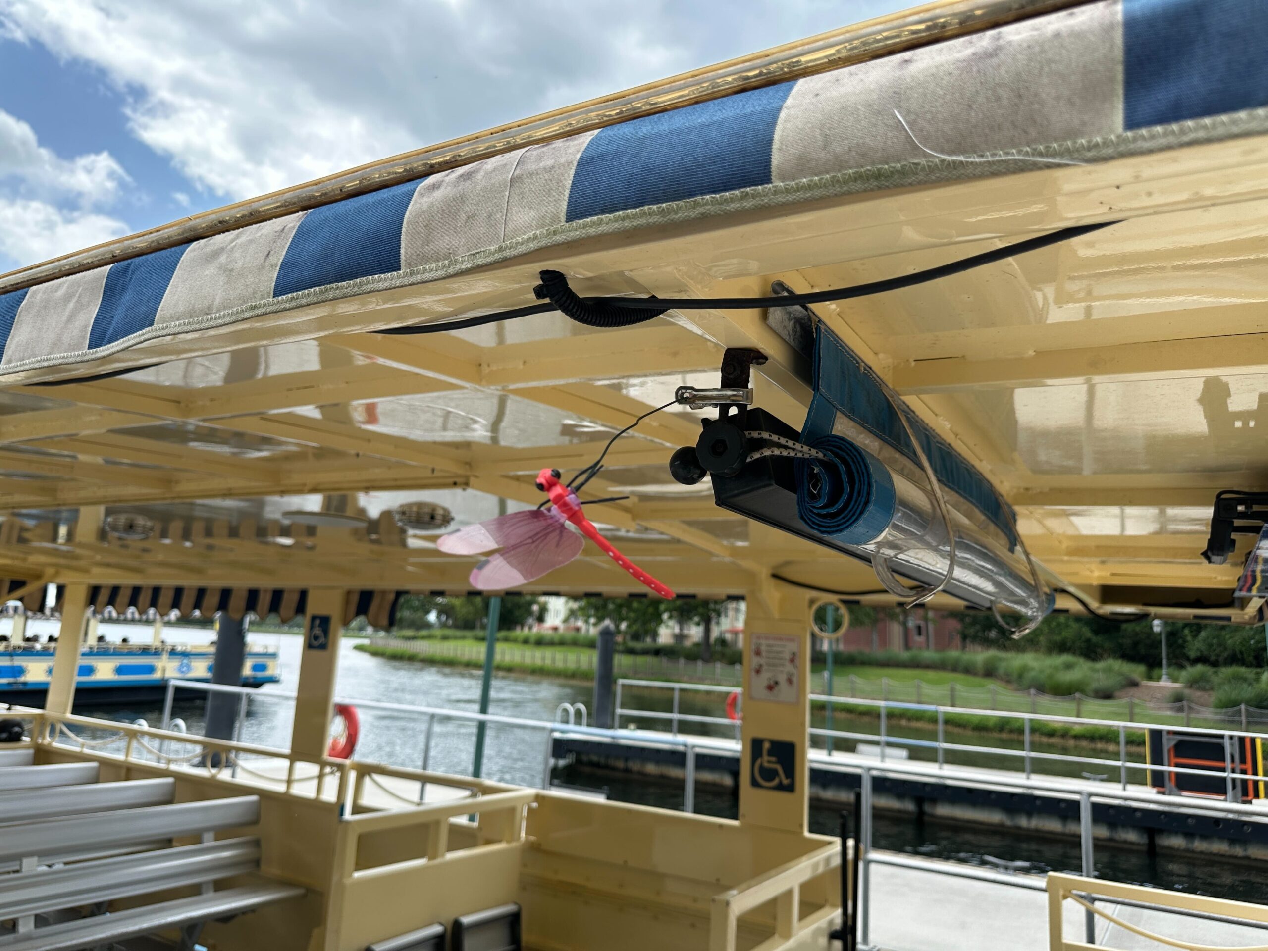 Fake red dragonfly on a boat at Saratoga Springs Resort.