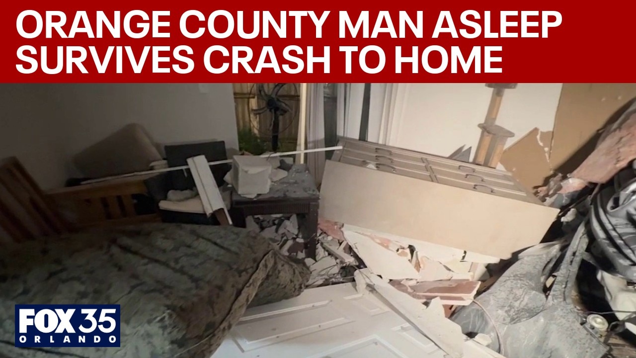 Man asleep survives crash to Orange County home