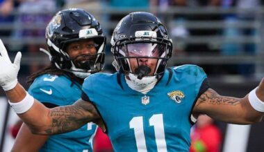 Jacksonville Jaguars wide receiver Parker Washington (11) celebrates his touchdown during the fourth quarter in an NFL football AFC Wild Card playoff matchup, Sunday, Jan. 11, 2026, in Jacksonville, Fla. Bills lead 10-7 at the half over the Jaguars. The Bills defeated the Jaguars 27-24.