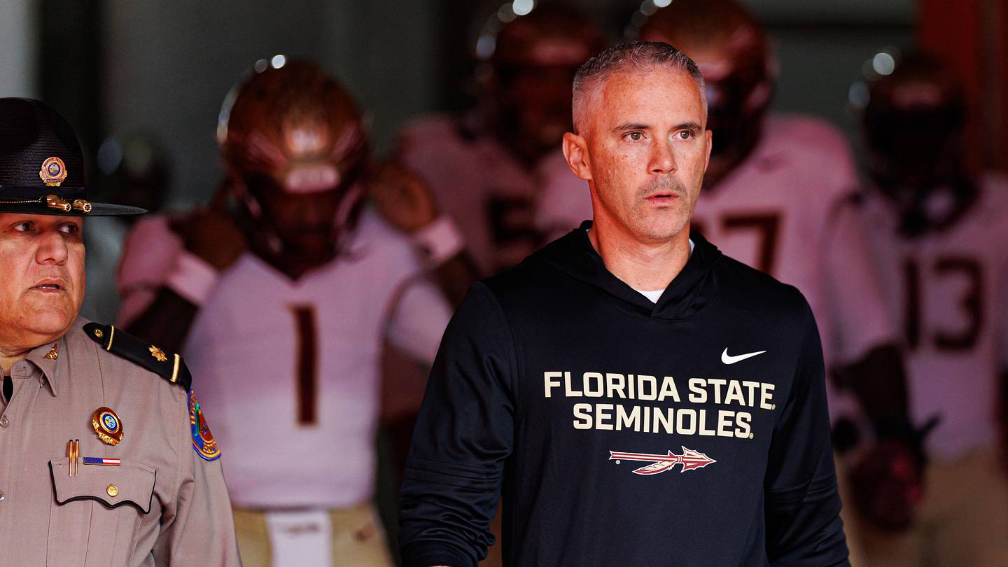 Nov 29, 2025; Gainesville, Florida, USA; Florida State Seminoles head coach Mike Norvell walks out of the tunnel before a game against the Florida Gators at Ben Hill Griffin Stadium. Mandatory Credit: Matt Pendleton-Imagn Images