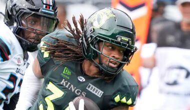 Louisville’s James Robinson gets a first down against the Dallas Renegades at Lynn Family Stadium