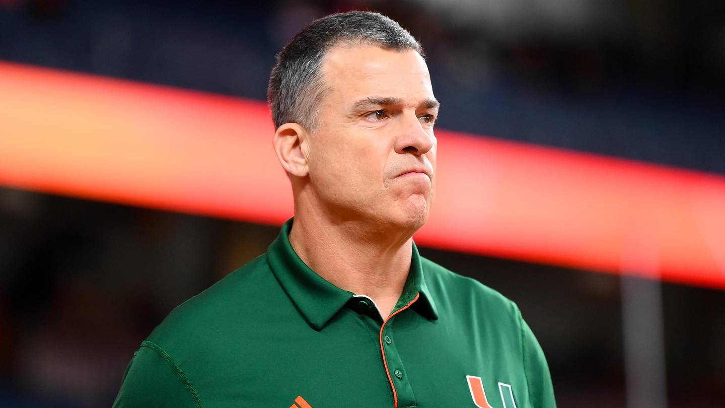 Nov 30, 2024; Syracuse, New York, USA; Miami Hurricanes head coach Mario Cristobal looks on prior to the game against the Syracuse Orange at the JMA Wireless Dome. Mandatory Credit: Rich Barnes-Imagn Images