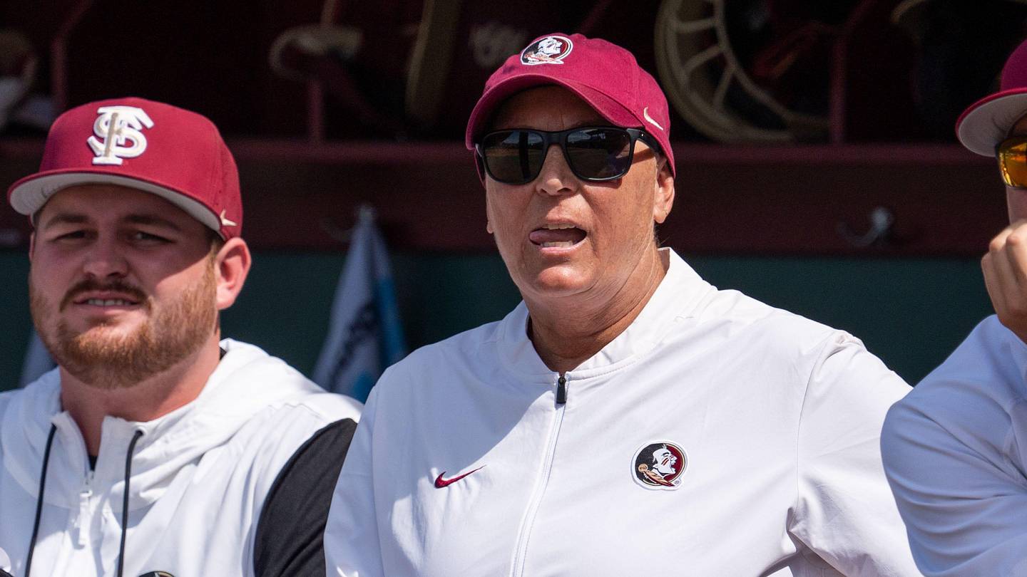 Florida State Seminoles head coach Lonni Alameda watches from the dugout. The Texas Tech Red Raiders defeated the Florida State Seminoles 2-1 in the NCAA WCWS Super Regionals on Friday, May 23, 2025.