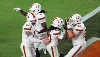 Jan 19, 2026; Miami Gardens, FL, USA; Miami Hurricanes wide receiver Malachi Toney (10) celebrates with offensive lineman James Brockermeyer (52) after scoring a touchdown against the Indiana Hoosiers during the second half of the College Football Playoff National Championship game at Hard Rock Stadium. Mandatory Credit: James Lang-Imagn Images