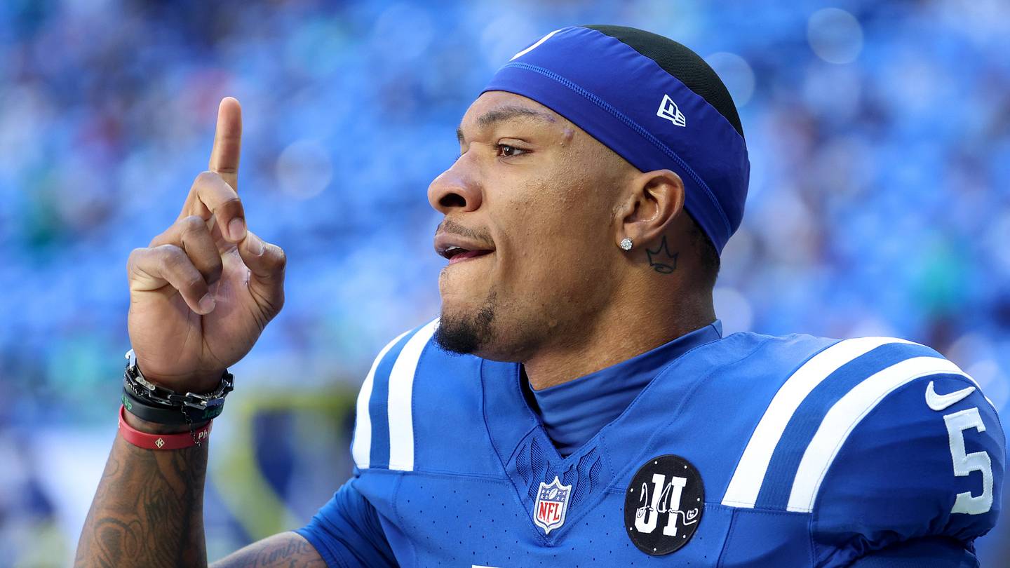 Sep 7, 2025; Indianapolis, Indiana, USA; Indianapolis Colts quarterback Anthony Richardson Sr. (5) warms up before a game against the Miami Dolphins at Lucas Oil Stadium.