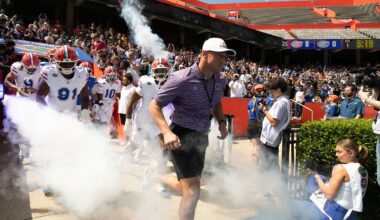 Florida head coach Jon Sumrall and the team blasts out onto the field before the Orange and Blue game at Steve Spurrier Field at Ben Hill Griffin Stadium in Gainesville, FL on Saturday, April 11, 2026. [Alan Youngblood/Gainesville Sun]