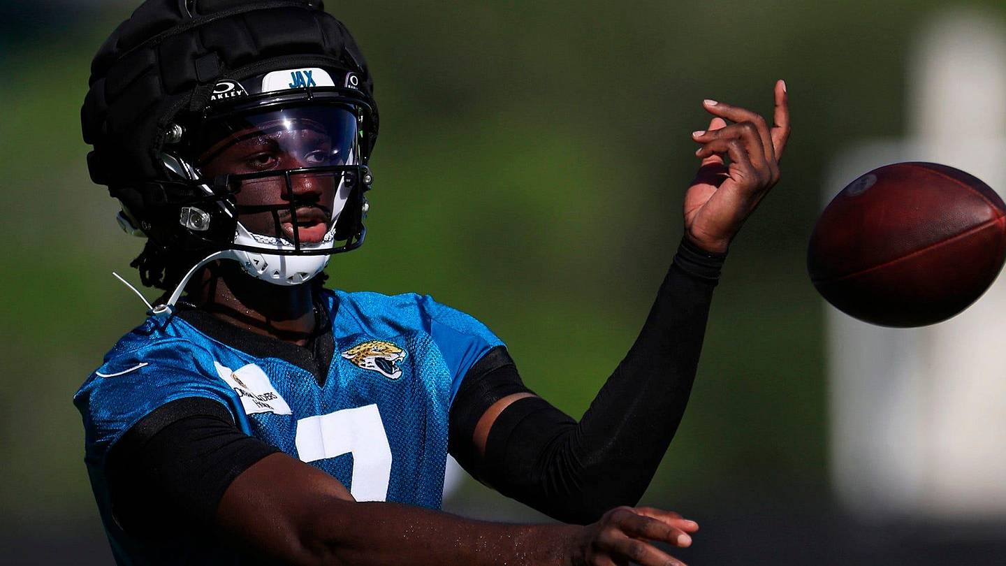 Jacksonville Jaguars wide receiver Brian Thomas Jr. (7) tosses the ball during the first day of an NFL football training camp practice Wednesday, July 24, 2024 at EverBank Stadiumâ€™s Miller Electric Center in Jacksonville, Fla.