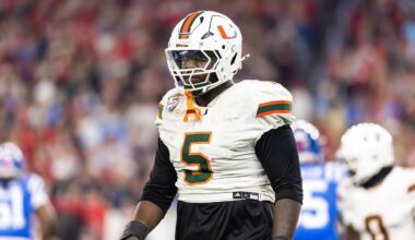 Jan 8, 2026; Glendale, AZ, USA; Miami Hurricanes defensive lineman Justin Scott (5) against the Mississippi Rebels during the 2026 Fiesta Bowl and semifinal game of the College Football Playoff at State Farm Stadium. Mandatory Credit: Mark J. Rebilas-Imagn Images