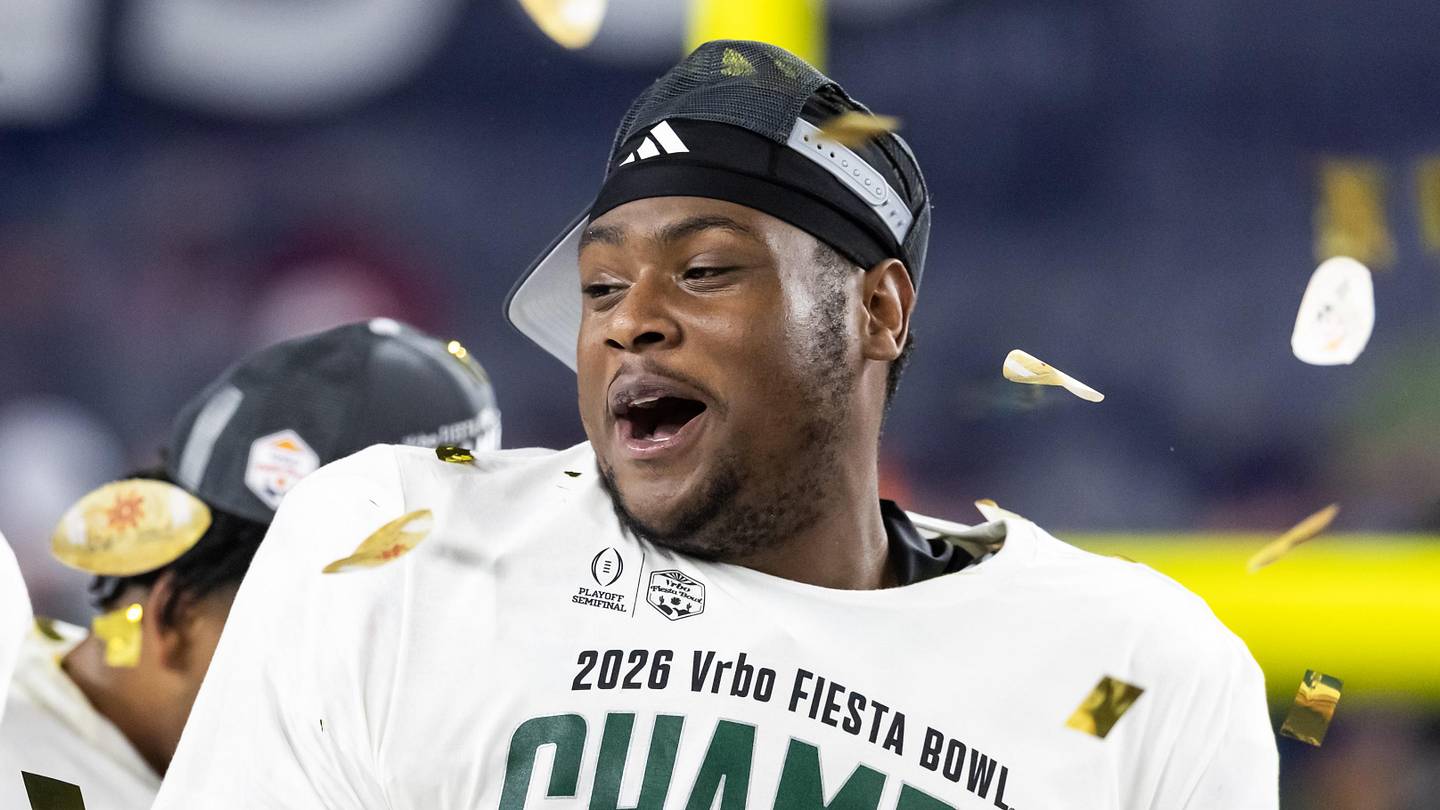 Jan 8, 2026; Glendale, AZ, USA; Miami Hurricanes defensive lineman Ahmad Moten Sr celebrates after defeating the Mississippi Rebels during the 2026 Fiesta Bowl and semifinal game of the College Football Playoff at State Farm Stadium. Mandatory Credit: Mark J. Rebilas-Imagn Images