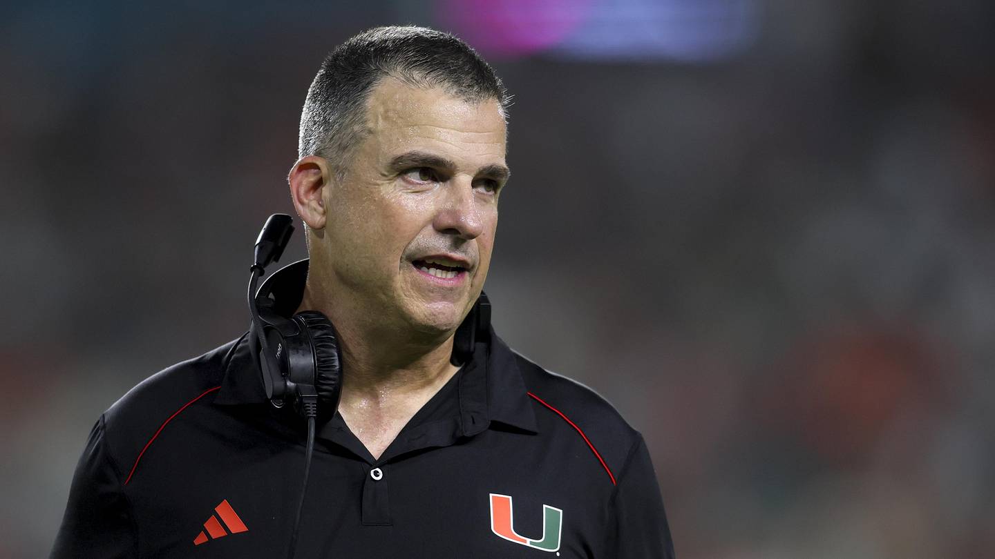 Sep 1, 2023; Miami Gardens, Florida, USA; Miami Hurricanes head coach Mario Cristobal looks on from the field against the Miami Redhawks during the third quarter at Hard Rock Stadium. Mandatory Credit: Sam Navarro-Imagn Images