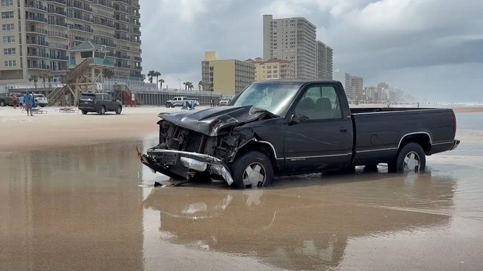 A truck stuck in the ocean