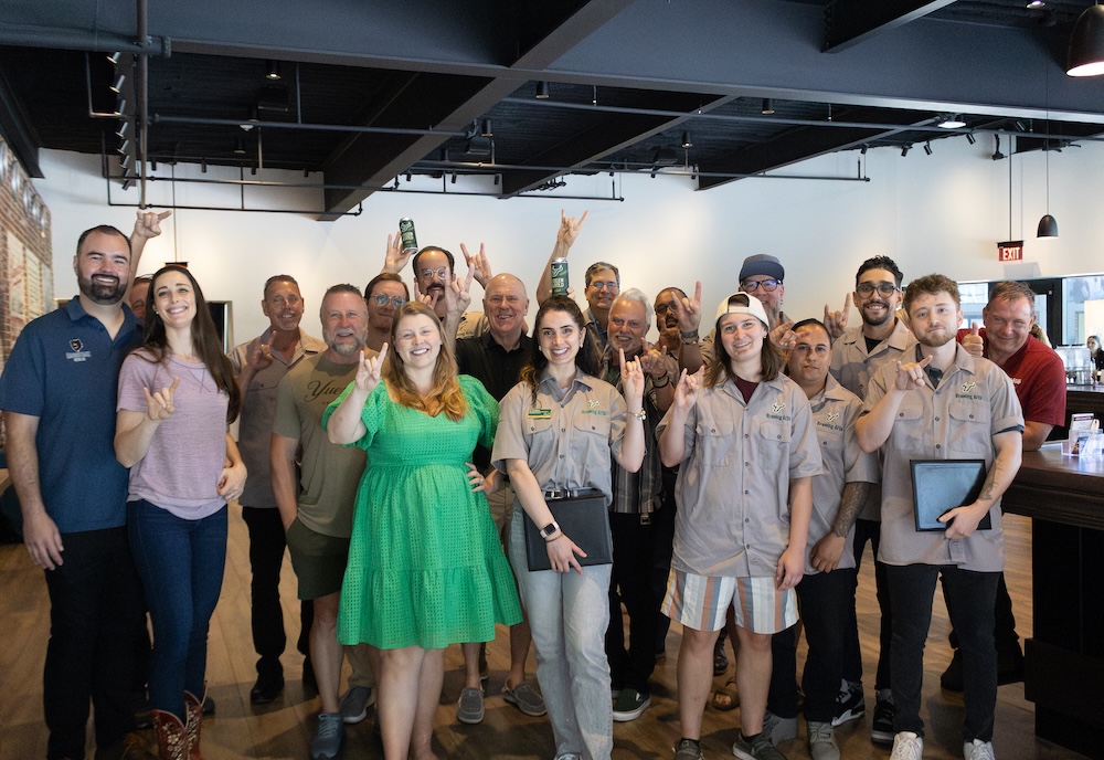 Recent graduates with faculty of brewing arts program.