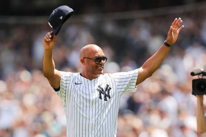 MLB: AUG 24 Rockies at Yankees BRONX, NY - AUGUST 24: Mariano Rivera salutes the crowd during the New York Yankees Old Timers Day on August 24, 2024 at Yankee Stadium in the Bronx, New York. (Photo by Andrew Mordzynski/Icon Sportswire via Getty Images)