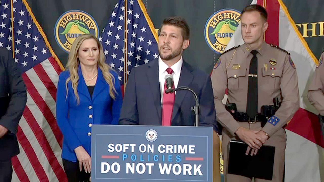 Florida Attorney General James Uthmeier accuses State Attorney Monique Worrell of being soft on crime during an event Friday at the Florida Highway Patrol office on International Drive in Orlando. (Spectrum News)