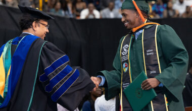 Dean Suvranu De, Ph.D., dean of the FAMU-FSU College of Engineering, congratulates a graduating engineering student during Florida A&M University's Spring 2026 Commencement Ceremony. This year's graduating cohort marked the largest group of FAMU engineering graduates in more than 25 years.