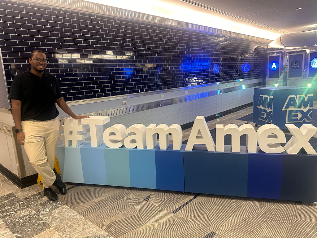 Hudson Taylor, a junior business administration student in Florida A&M University's School of Business and Industry, poses during his internship with American Express.