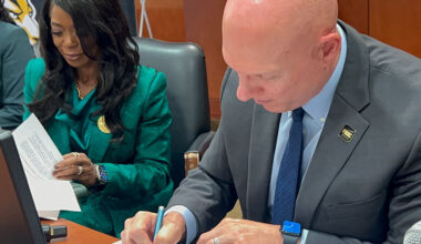 President Johnson and President Hall at MOU Signing