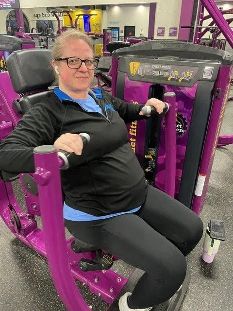 Terri Sue Lawson, working on the chest-press machine, isn’t picky about the type of music as long as it has a good beat.