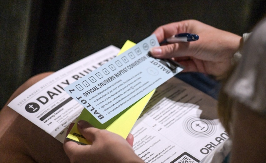 A Southern Baptist Convention messenger prepares to fill out her ballot at the SBC Annual Meeting in Orlando, Florida, on Wednesday, June 10, 2026.